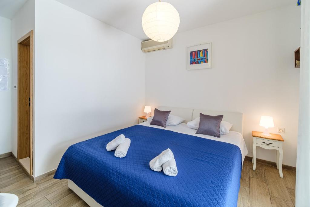 Postel nebo postele na pokoji v ubytování Rooms Anna