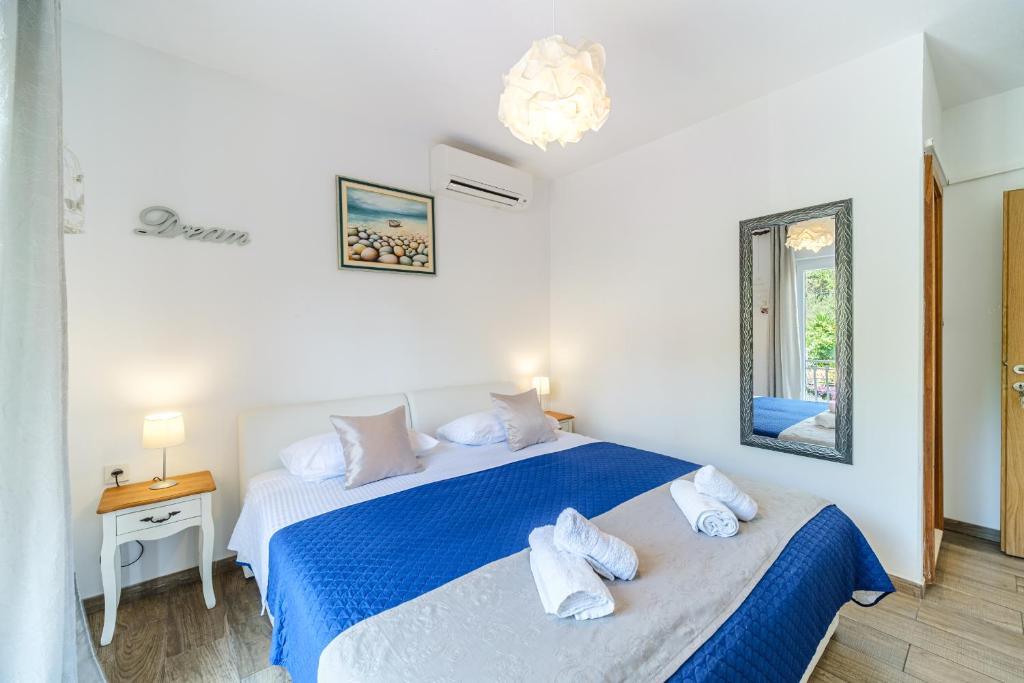 Postel nebo postele na pokoji v ubytování Rooms Anna