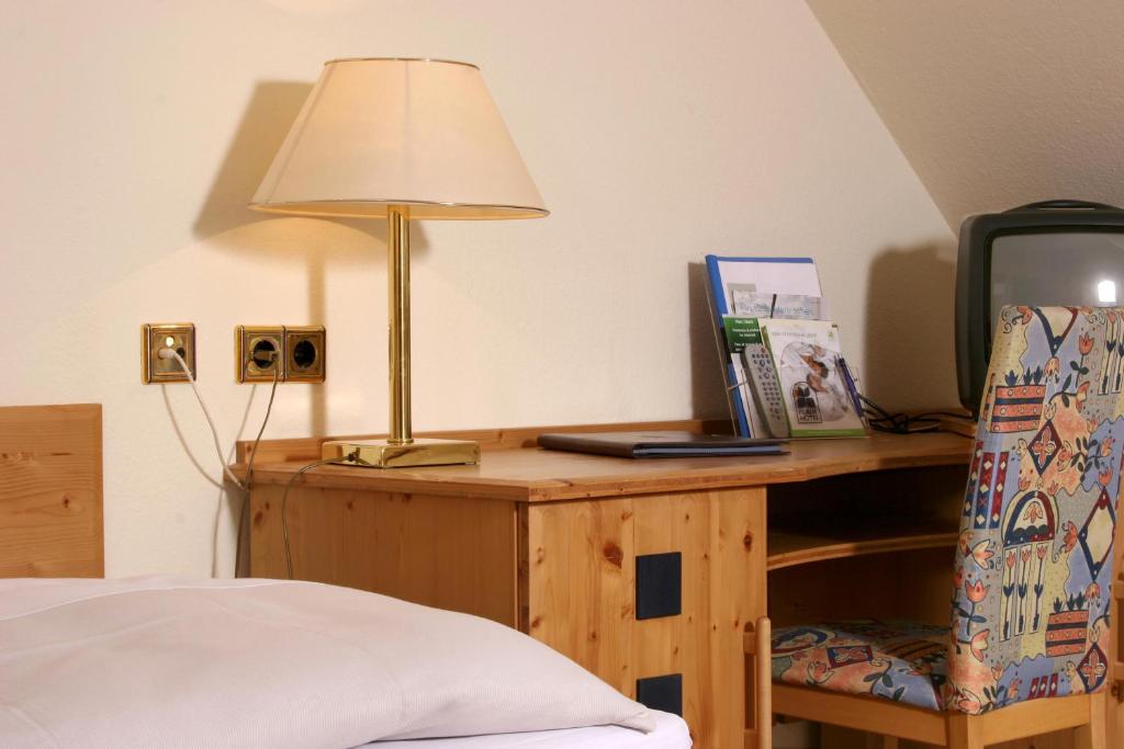 Postel nebo postele na pokoji v ubytování Flair-Hotel Zum Benediktiner