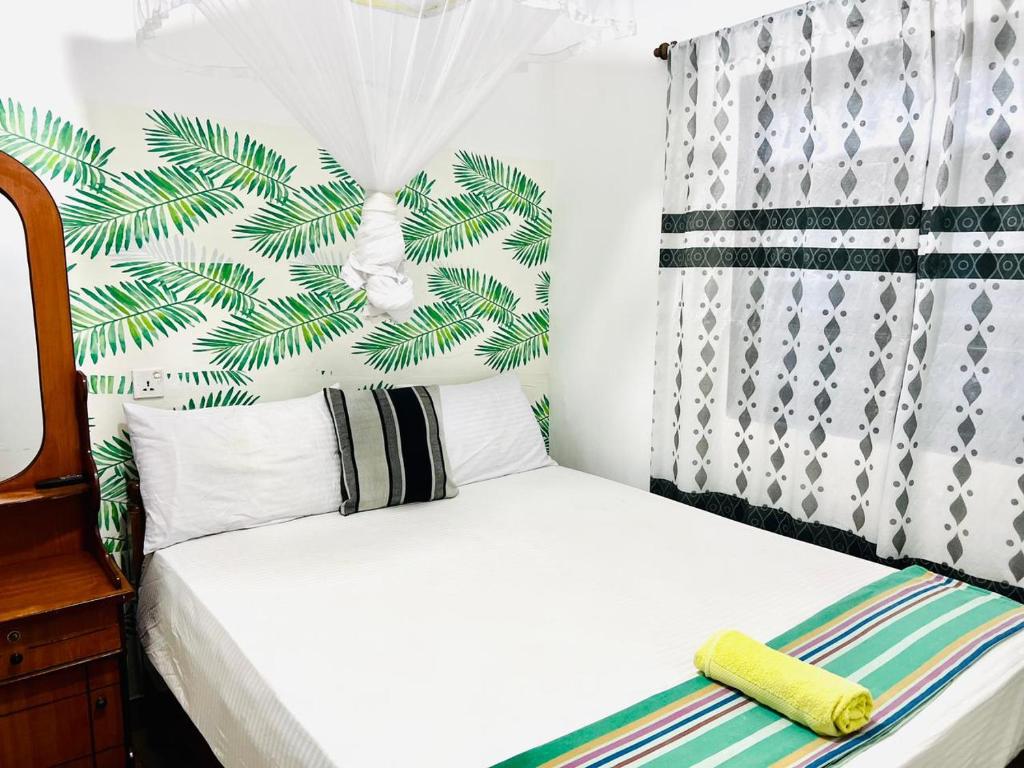 Postel nebo postele na pokoji v ubytování Village feel home stay