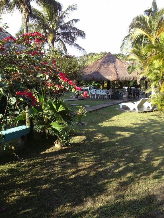 Um jardim em Pousada Canto da Galheta