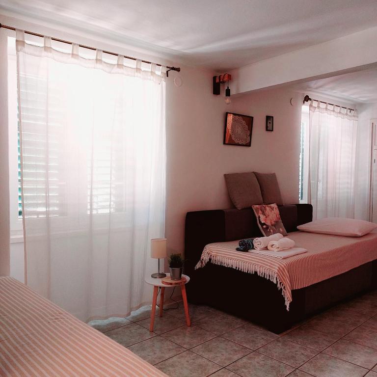 Postel nebo postele na pokoji v ubytování Apartment Obala