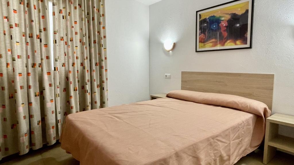 Posteľ alebo postele v izbe v ubytovaní Apartament ARTS 1