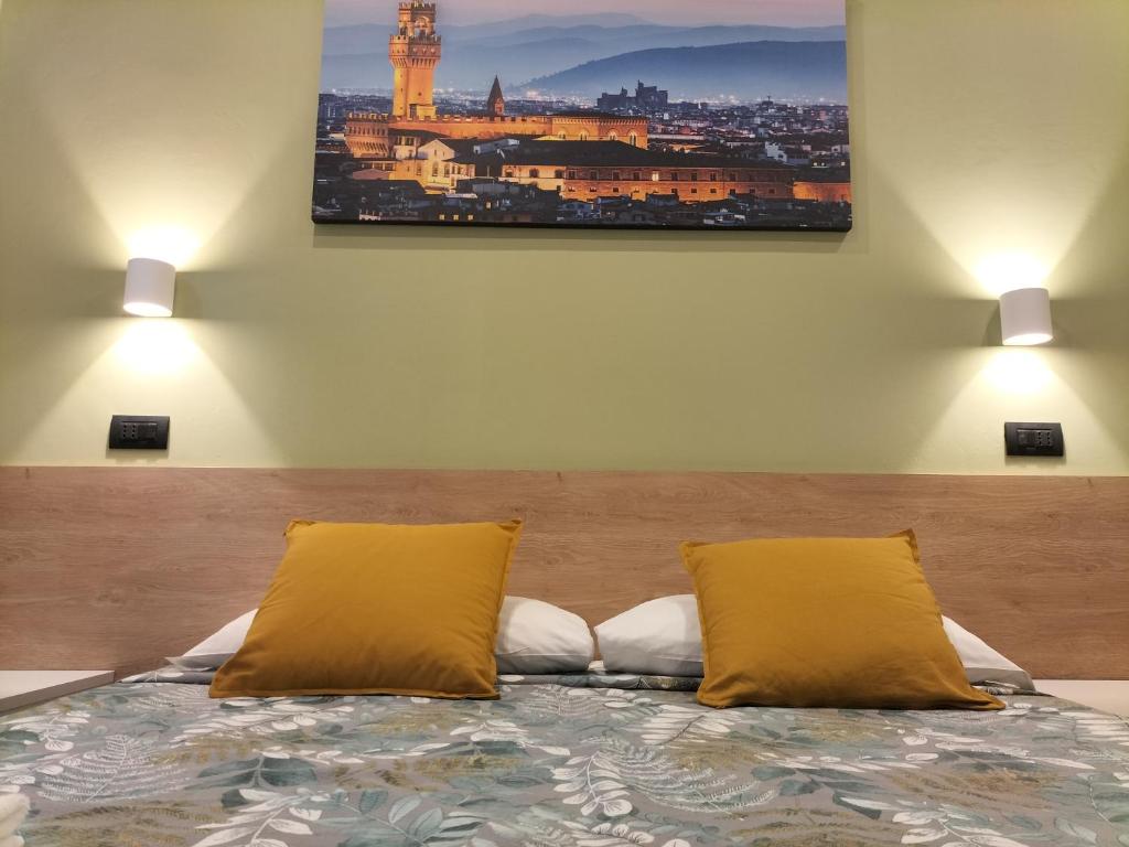 Posteľ alebo postele v izbe v ubytovaní Hotel Camilla Guelfa