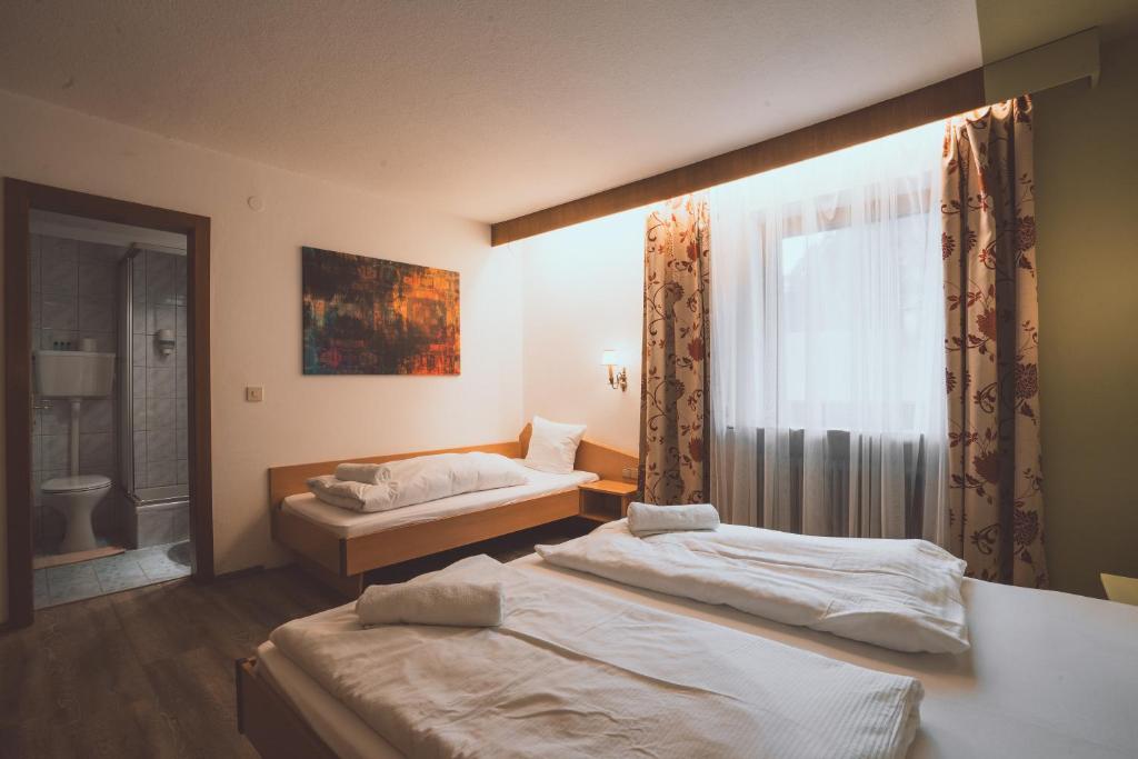 Postel nebo postele na pokoji v ubytování PhiliPop-Up Hostel