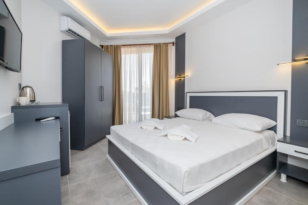 Ένα ή περισσότερα κρεβάτια σε δωμάτιο στο Pera Side Hotel