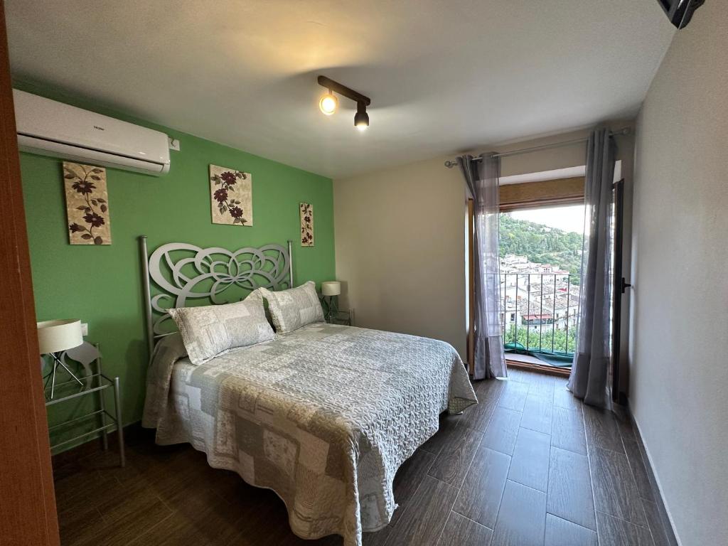 Posteľ alebo postele v izbe v ubytovaní Casa Tio Paco