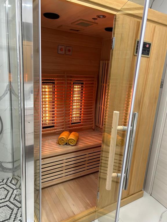 a sauna with two loaves of bread in a room at Rijeka UrbanSPA in Rijeka