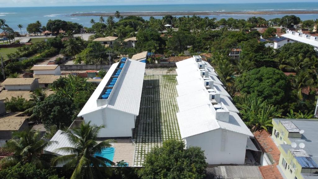 an aerial view of the resort at Casa para temporada 50m da praia in Porto Seguro