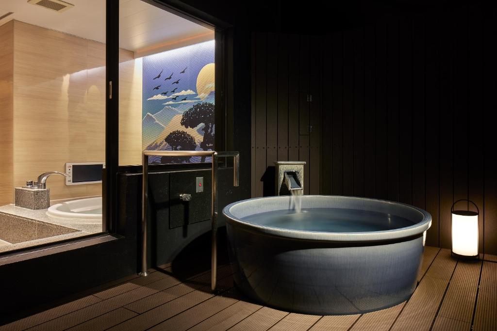 Koupelna v ubytování Nagoya Hotel HOQA Hanaironoyu