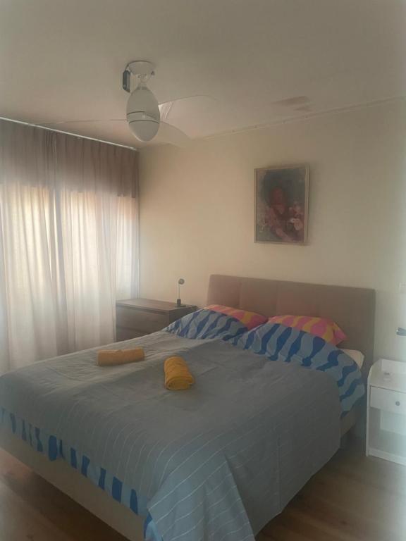 Postel nebo postele na pokoji v ubytování Huis aan de Haven