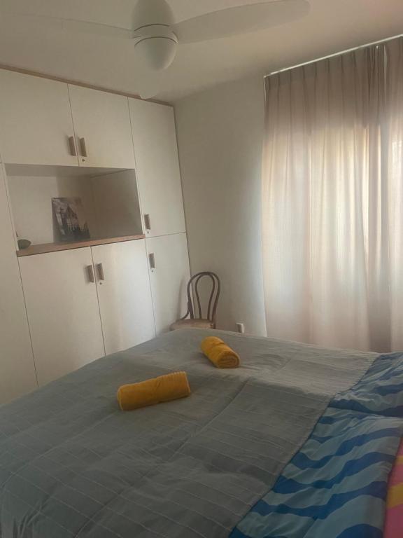 Postel nebo postele na pokoji v ubytování Huis aan de Haven