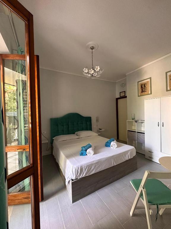 Postel nebo postele na pokoji v ubytování Casa Himera Fontane Bianche