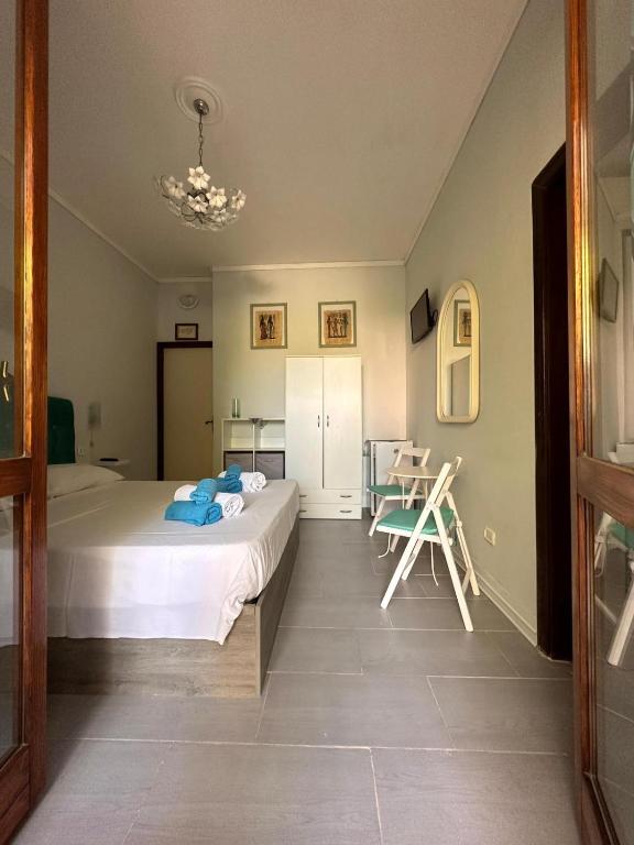 Postel nebo postele na pokoji v ubytování Casa Himera Fontane Bianche