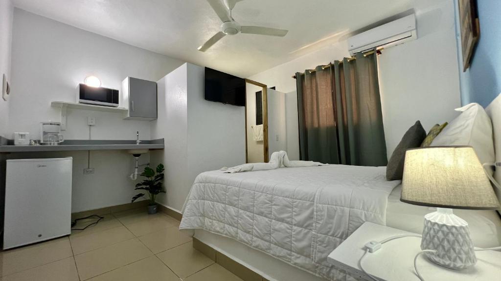 Postel nebo postele na pokoji v ubytování Chill Boutique Hotel