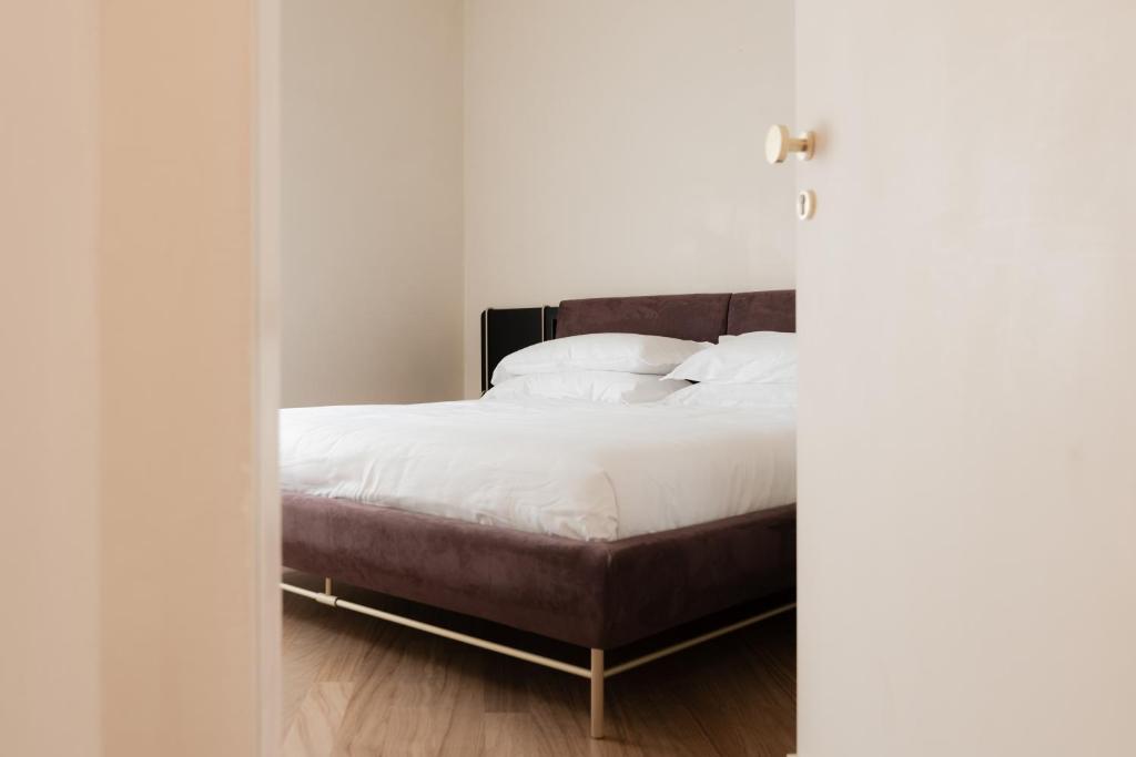 Postel nebo postele na pokoji v ubytování Palazzo Mazzini