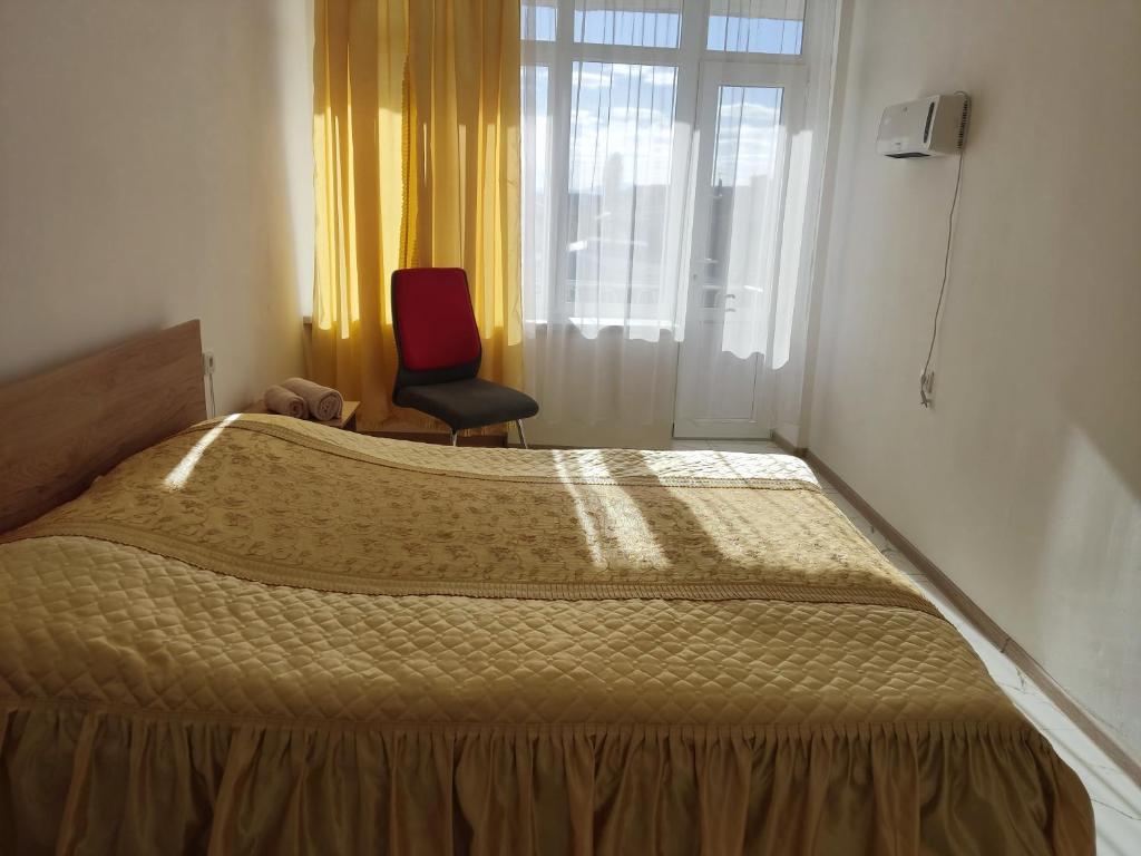 Postel nebo postele na pokoji v ubytování Hotel Talin