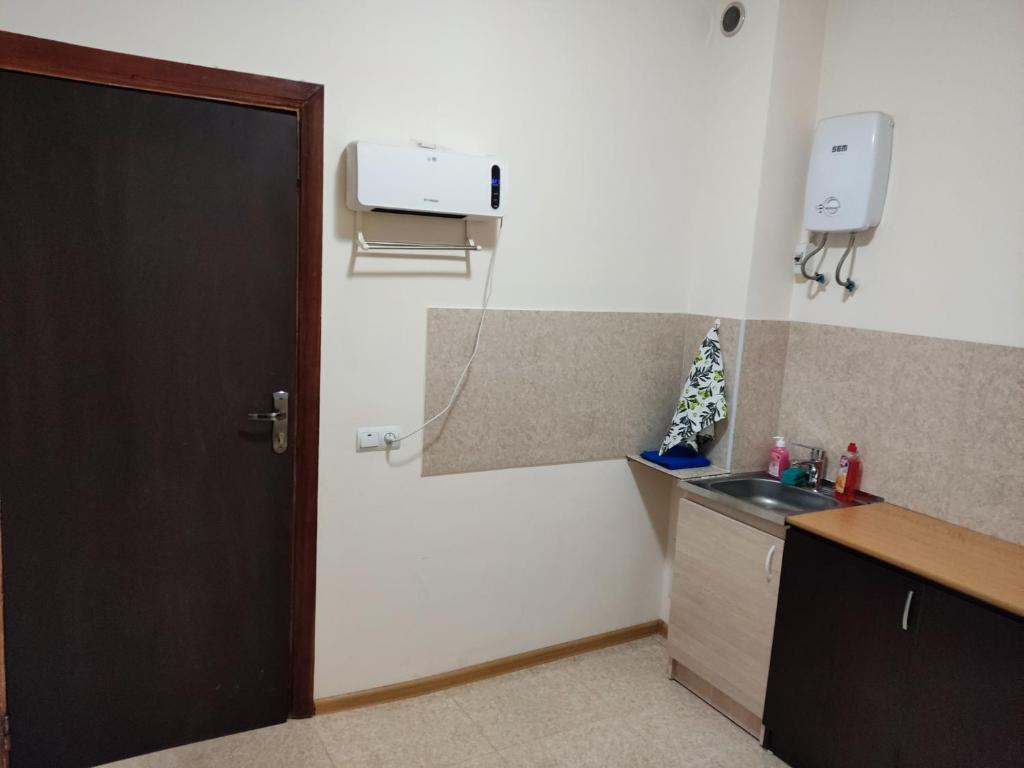 Kuchyň nebo kuchyňský kout v ubytování Hotel Talin