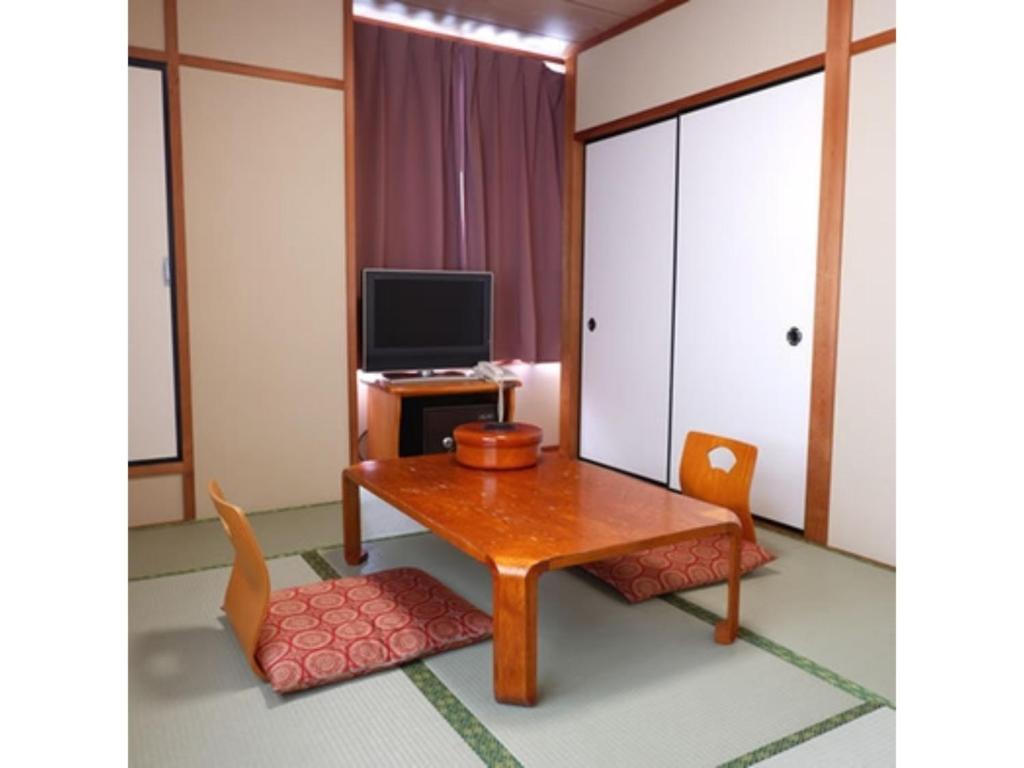 A television and/or entertainment centre at Aji no Yado Michishio - Vacation STAY 93780v