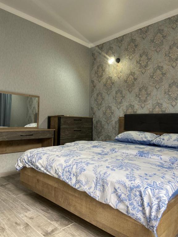 Postel nebo postele na pokoji v ubytování Уютный Дворик
