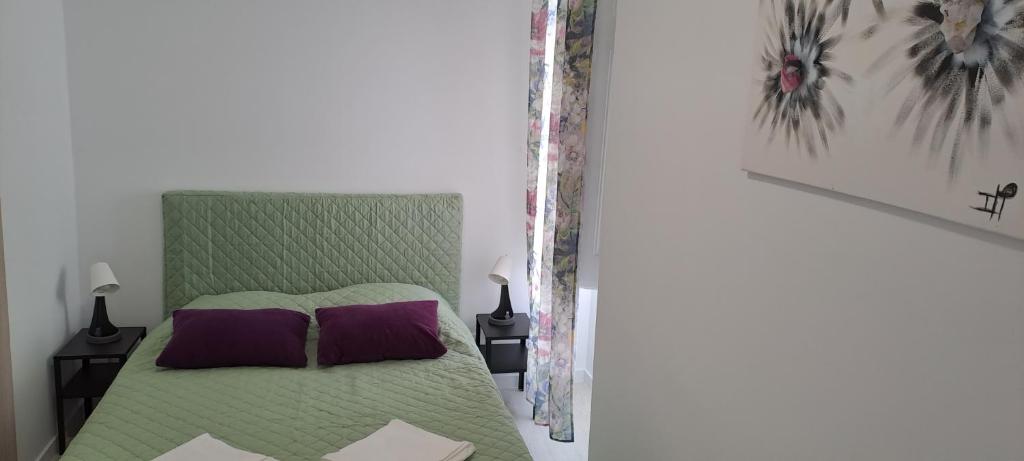 Postel nebo postele na pokoji v ubytování Setubal Holiday Apartment