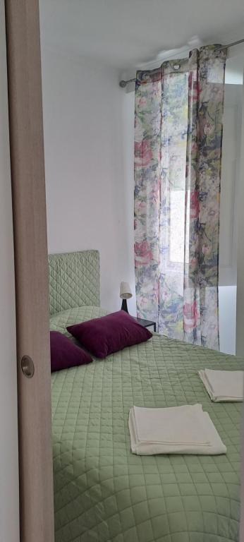 Postel nebo postele na pokoji v ubytování Setubal Holiday Apartment