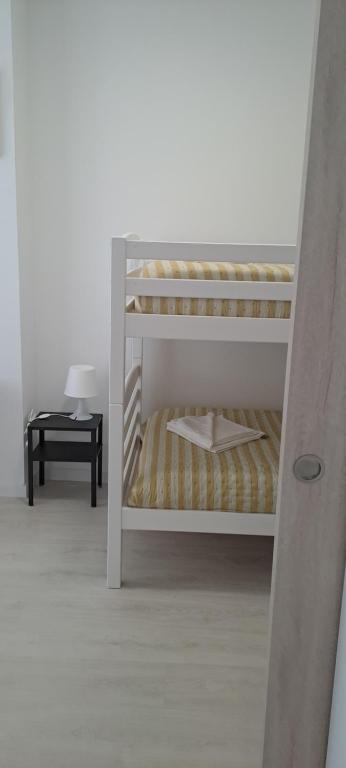 Postel nebo postele na pokoji v ubytování Setubal Holiday Apartment