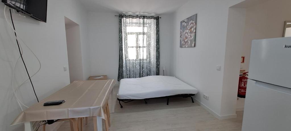 TV a/nebo společenská místnost v ubytování Setubal Holiday Apartment