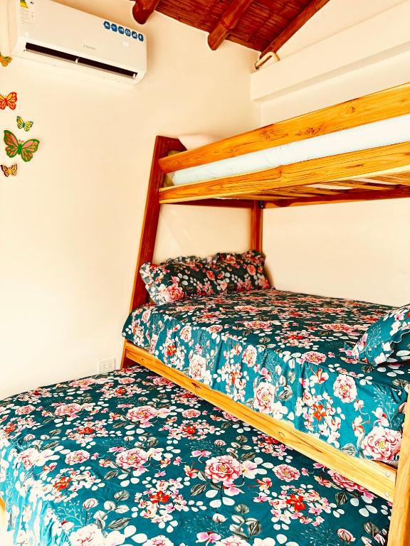 Postel nebo postele na pokoji v ubytování Cabaña de Elsa