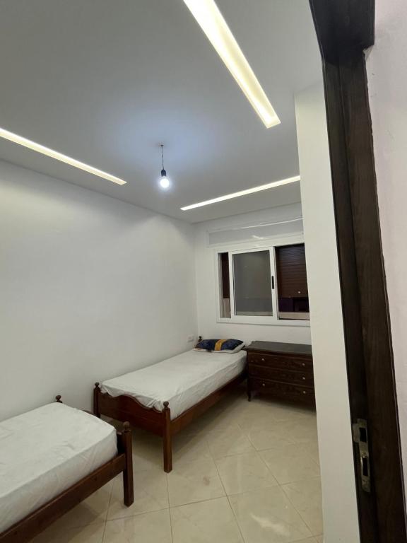 Postel nebo postele na pokoji v ubytování Appartement MIRAMAR