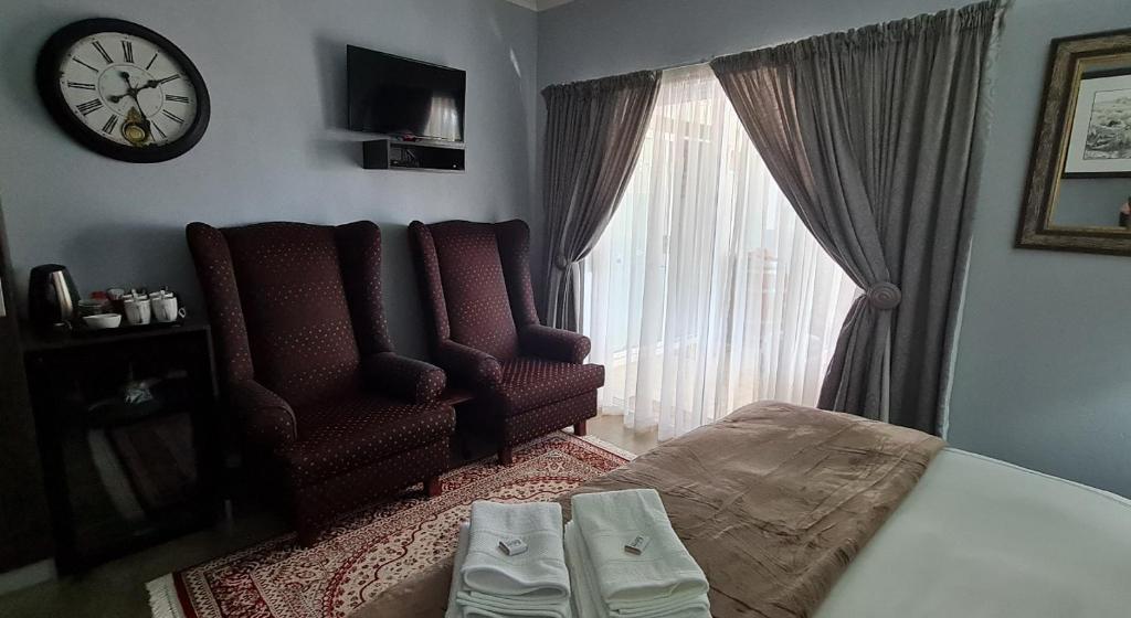 Postel nebo postele na pokoji v ubytování Kairos Guesthouse Orania