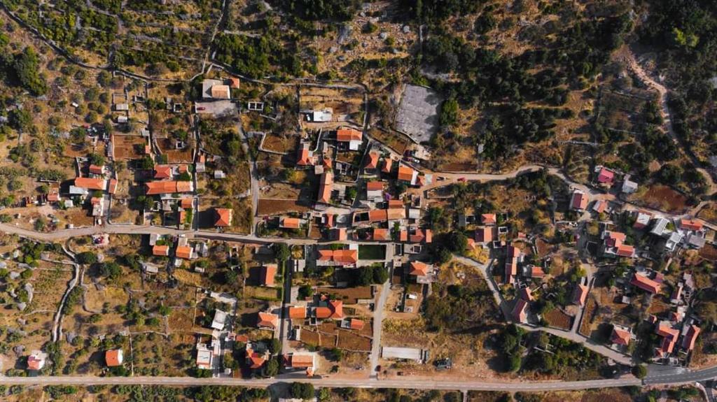 an overhead view of a village with houses and roads at Flower in Poljica