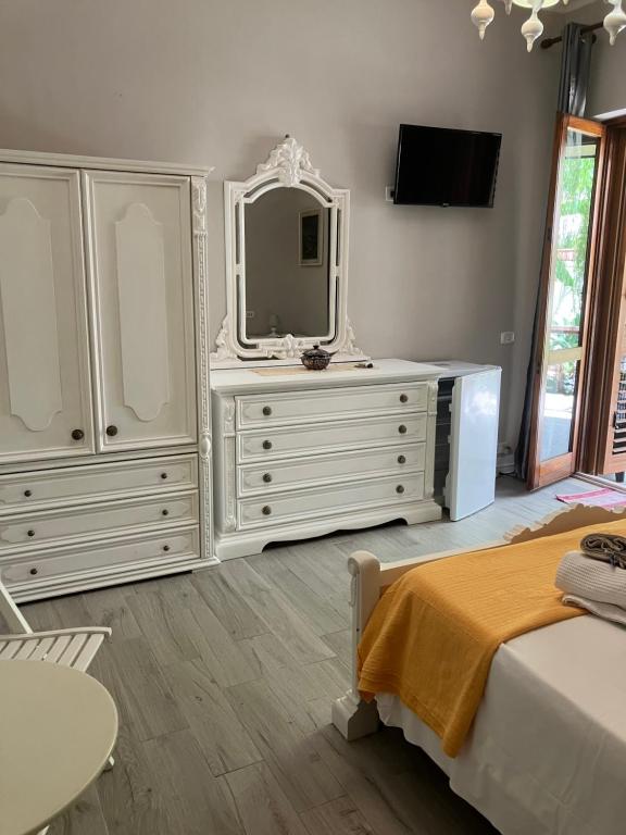Postel nebo postele na pokoji v ubytování Casa Himera Fontane Bianche