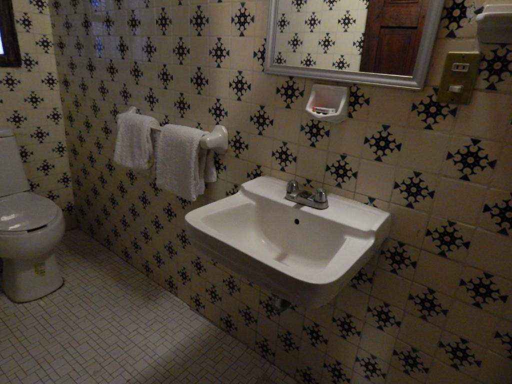 Koupelna v ubytování Hotel Molino del Rey
