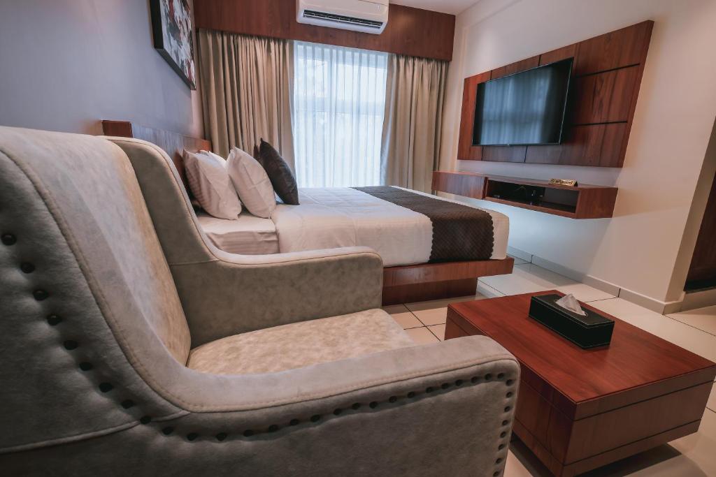 TV a/nebo společenská místnost v ubytování Fortview Suites