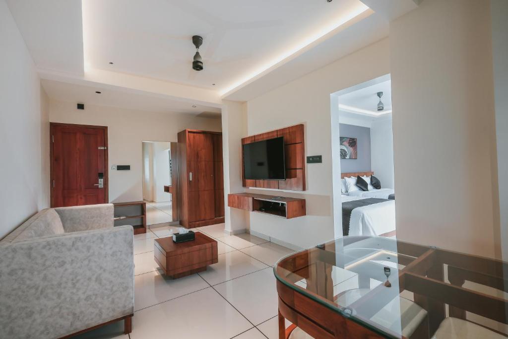 TV a/nebo společenská místnost v ubytování Fortview Suites
