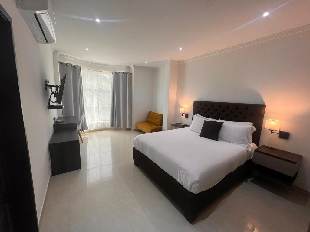Postel nebo postele na pokoji v ubytování Hotel Zuriel Boutique