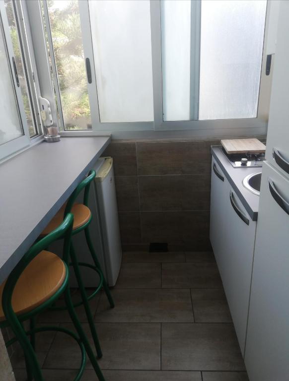A kitchen or kitchenette at Max B&B Fiera