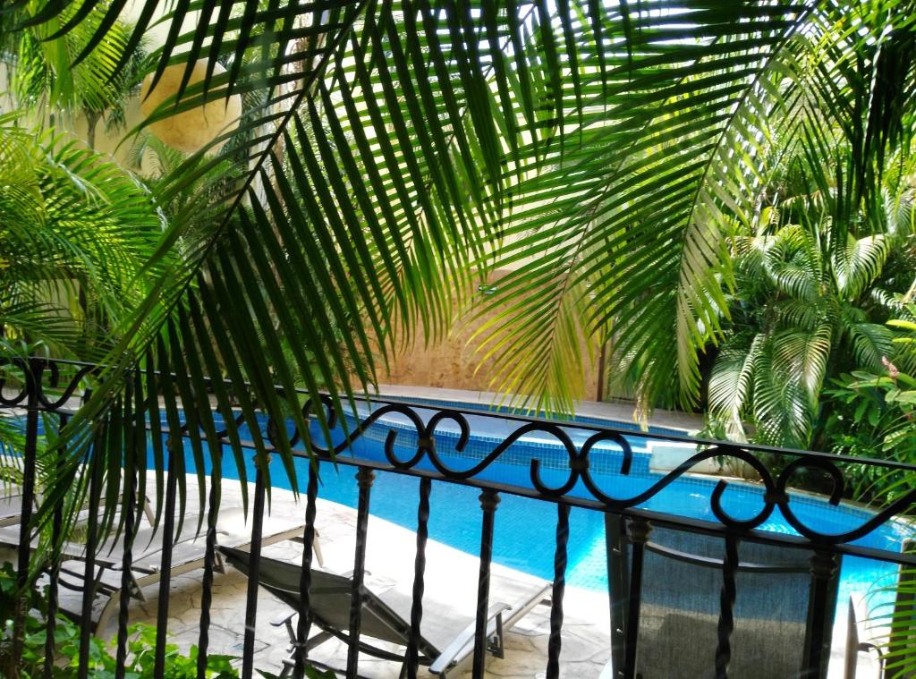 Bazén v ubytování Gran Real Yucatan nebo v jeho okolí