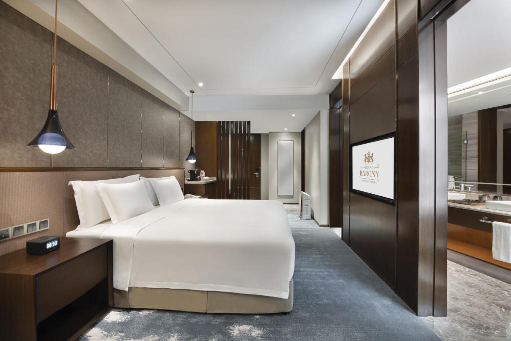 Grand Barony Qingdao Airport Hotel - Quarto De Cama Administrativo