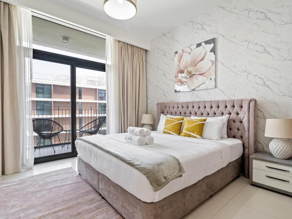 Postel nebo postele na pokoji v ubytování Fantastic 1 BR in Park Point - Dubai Hills