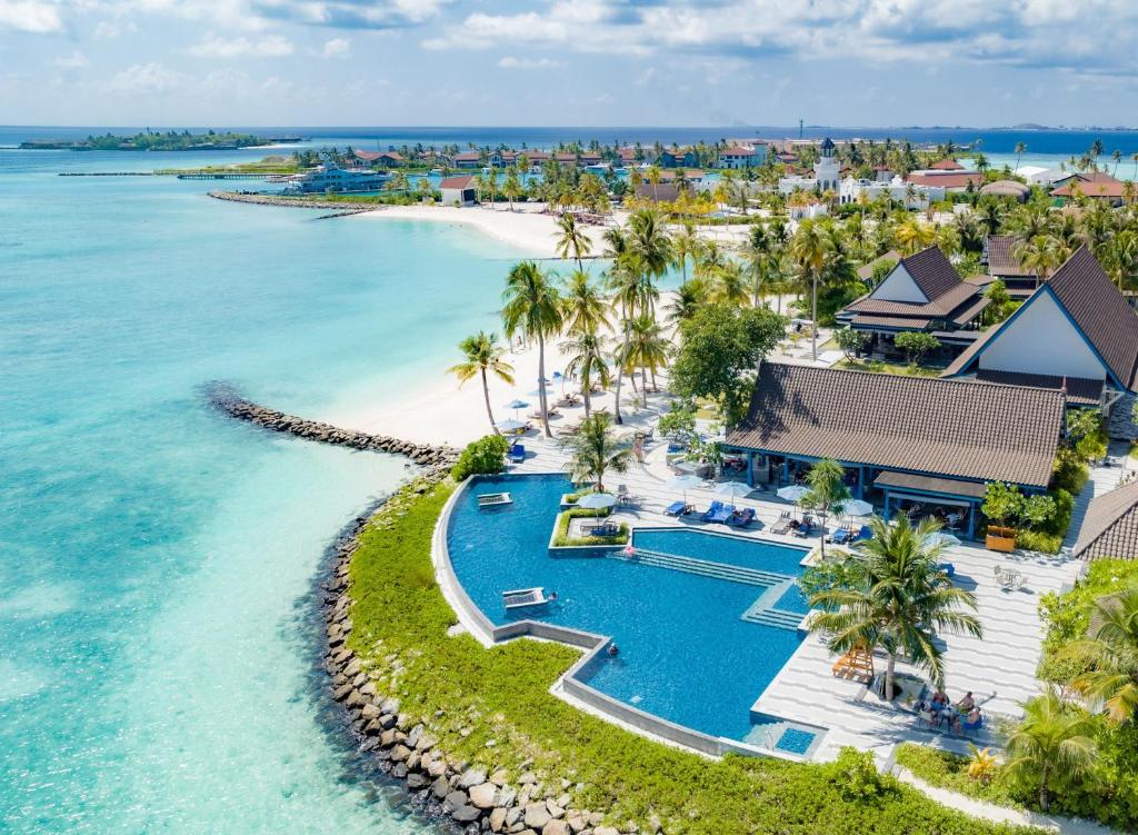 an aerial view of the resort and the ocean at SAii Lagoon Maldives, Curio Collection By Hilton in South Male Atoll