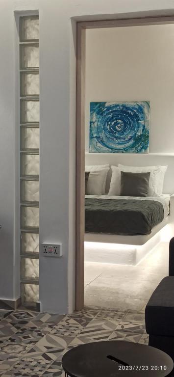 Postel nebo postele na pokoji v ubytování AB Green Living Santorini