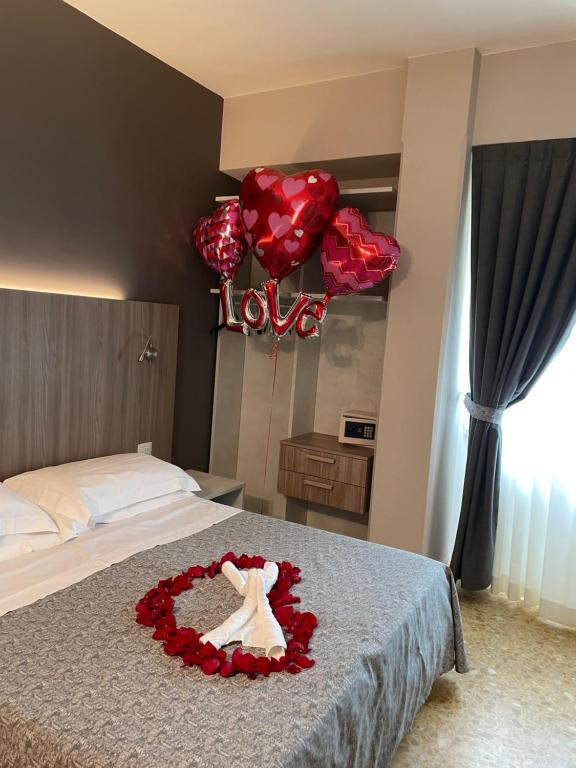 Postel nebo postele na pokoji v ubytování Hotel Lukas