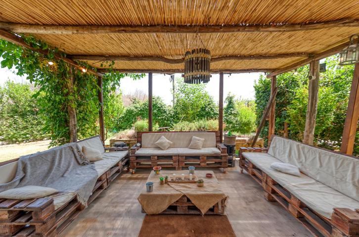 Posezení v ubytování Masseria li Vecchi