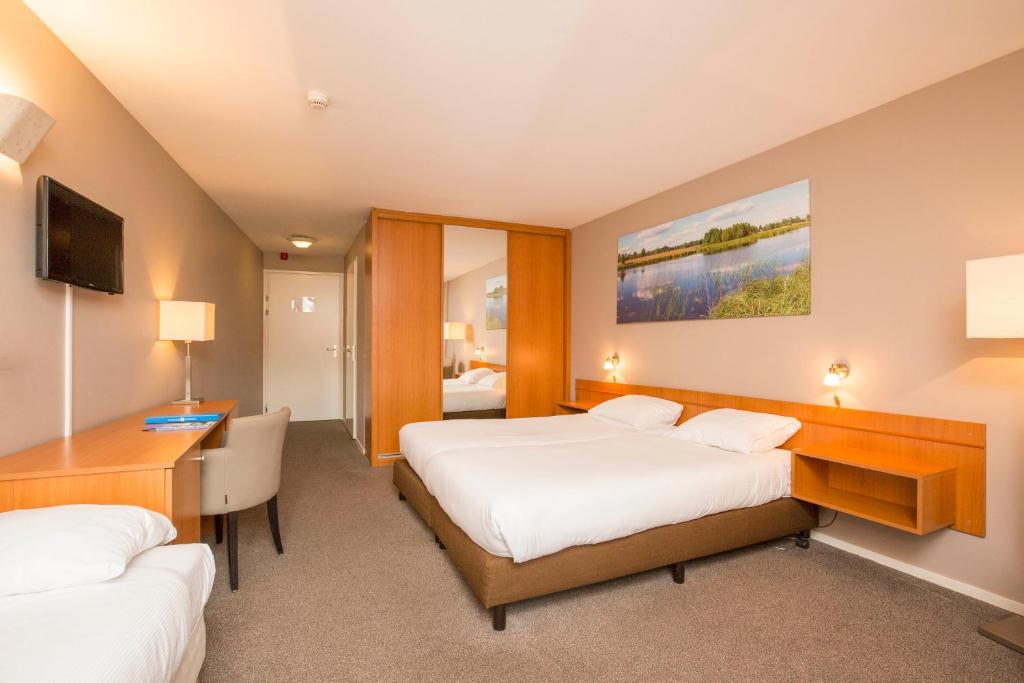 Postel nebo postele na pokoji v ubytování Fletcher Hotel - Resort Spaarnwoude