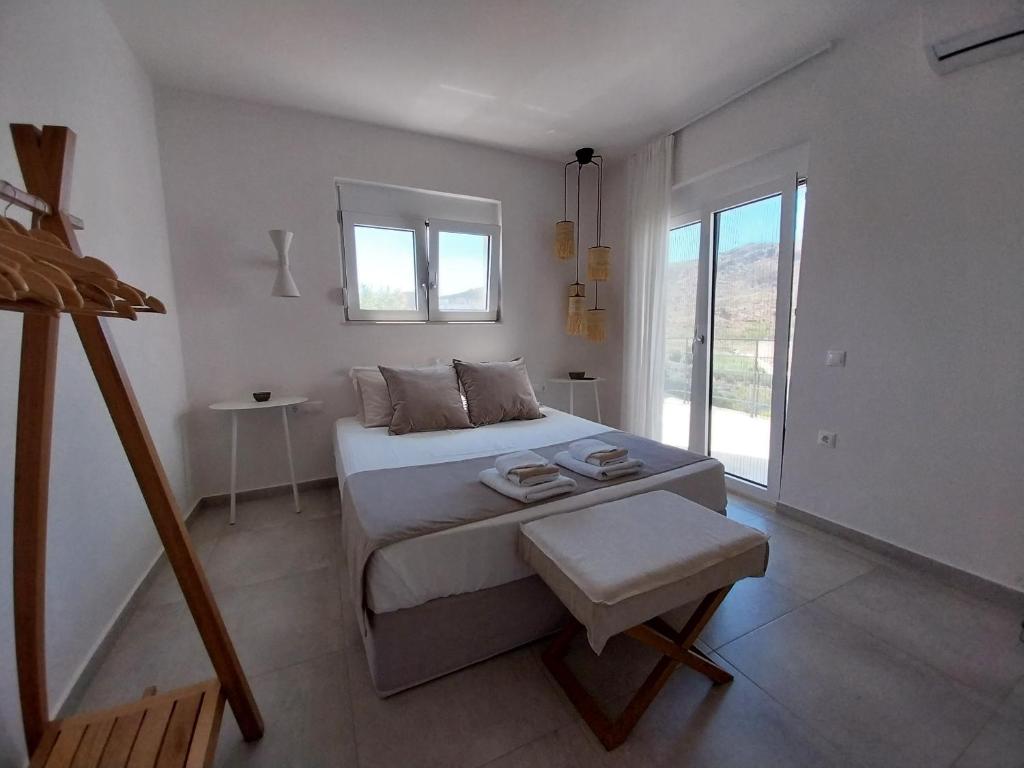 Postel nebo postele na pokoji v ubytování Villa Evriali