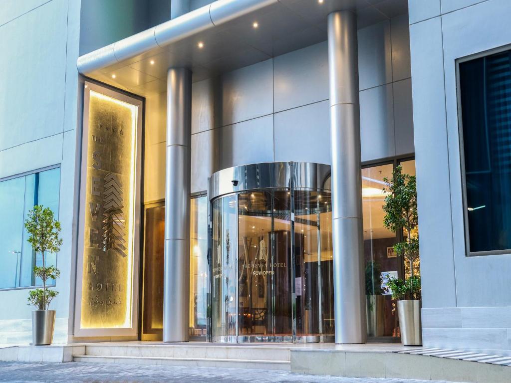 a facade of a building with columns at The Seven Hotel in Manama