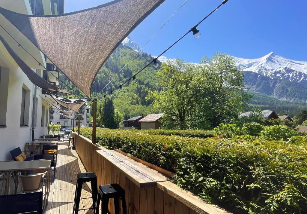 a balcony with a view of a mountain at Plan B Hotel - Living Chamonix in Chamonix