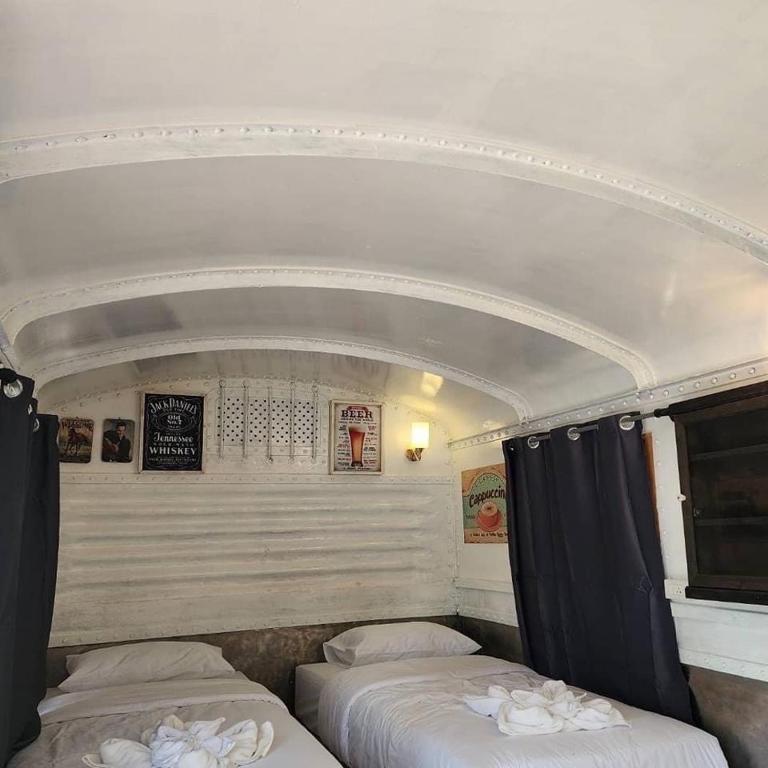 Postel nebo postele na pokoji v ubytování ภูผาหน้าเล PhuPha-NaLay Cafe'n Camping